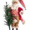 Allstate 24" Red And White Santa Claus Holding Tree Christmas Tabletop Decor
