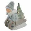 Northlight 15" Beige And Green Lighted Boy On A Sled Christmas Decoration