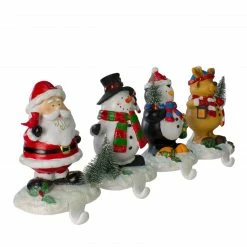 Northlight Set Of 4 Santa, Snowman, Penguin And Reindeer Christmas Stocking Holders 5.75" 6 Northlight Set Of 4 Santa, Snowman, Penguin And Reindeer Christmas Stocking Holders 5.75" -Northlight Shop northlight dw27719 1 73579.1661801385