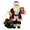 Northlight 12" Santa Claus Holding Gift Bag And Presents Christmas Figure