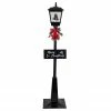 Northlight 70.75" Lighted Musical Snowing Santa And Friends Christmas Street Lamp